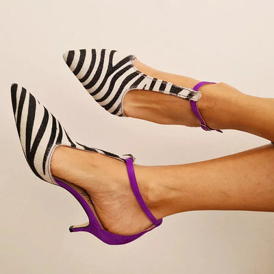 Elle | patent leather stilettos with zebra print and pointed heels
