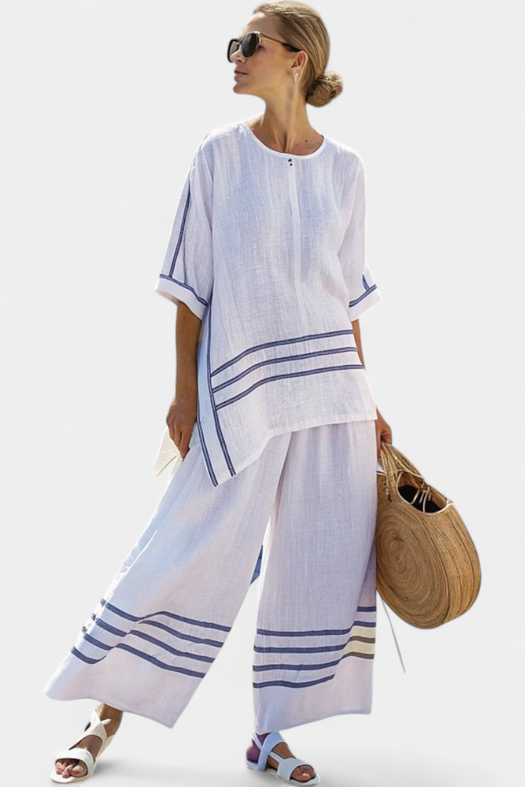 Complete with wide striped trousers with an irregular cut - modern and comfortable style