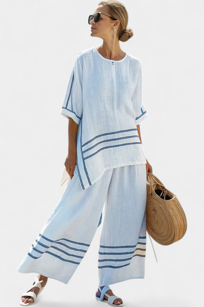 Complete with wide striped trousers with an irregular cut - modern and comfortable style