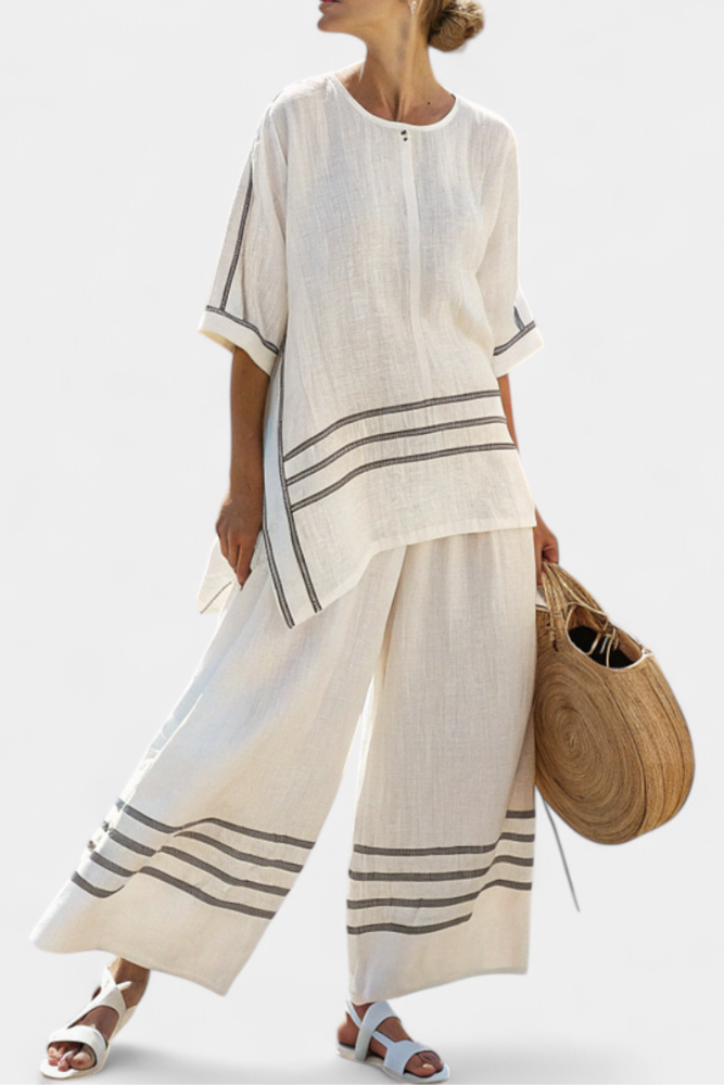 Complete with wide striped trousers with an irregular cut - modern and comfortable style