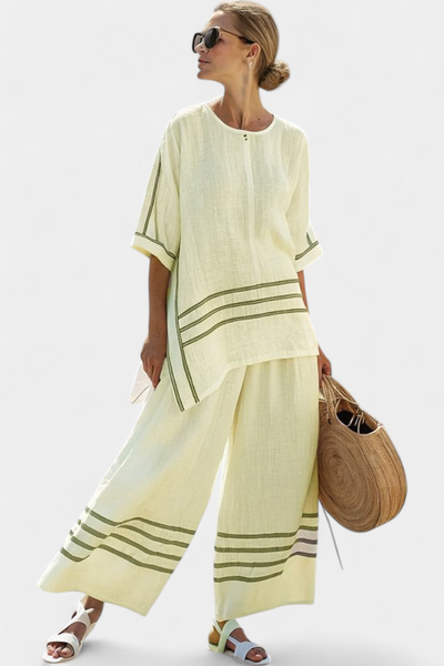 Complete with wide striped trousers with an irregular cut - modern and comfortable style