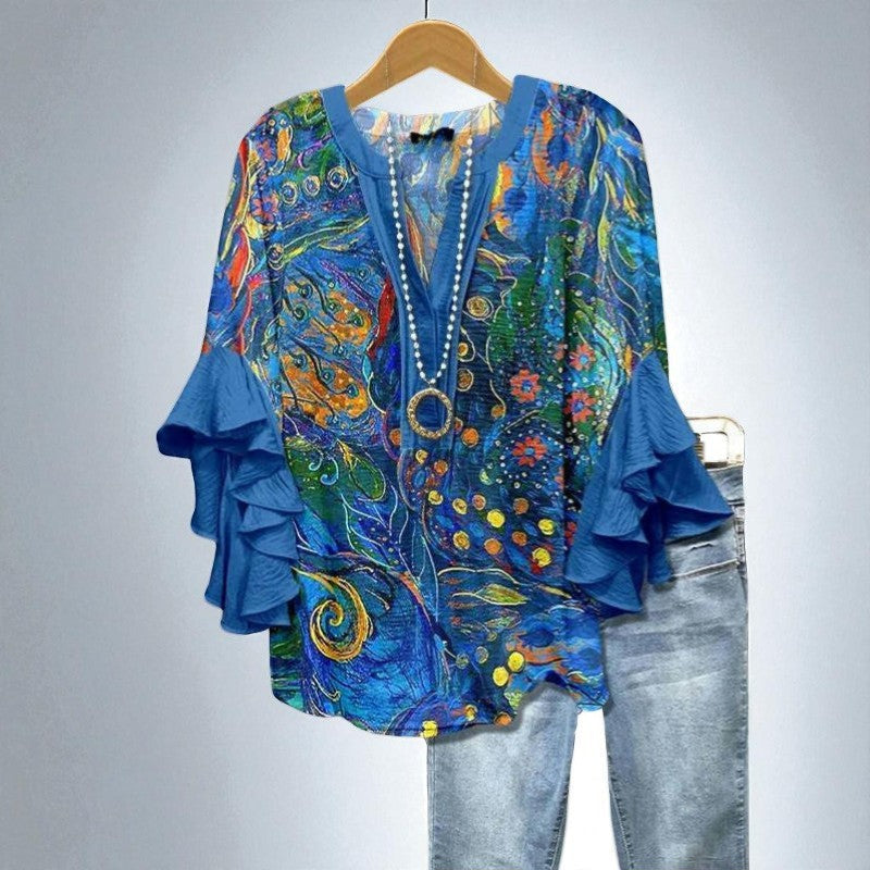 Aurianne – Artistic blouse in vibrant colours with flared sleeves