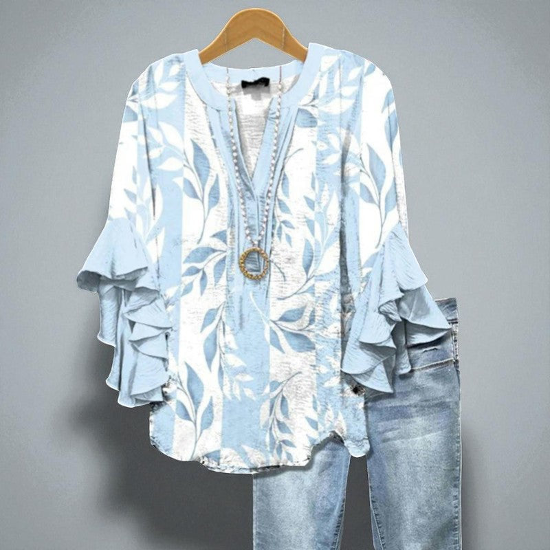 Éliane – Light Blue Blouse with Leaf Pattern and Ruffled Sleeves